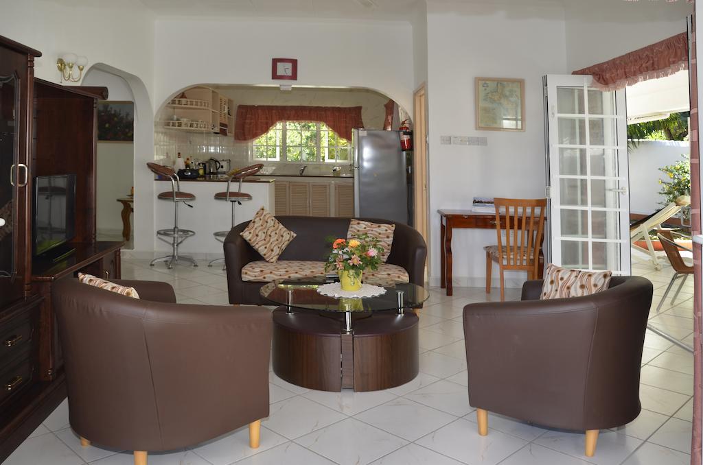 Ixora Villa Anse Royale Kamer foto