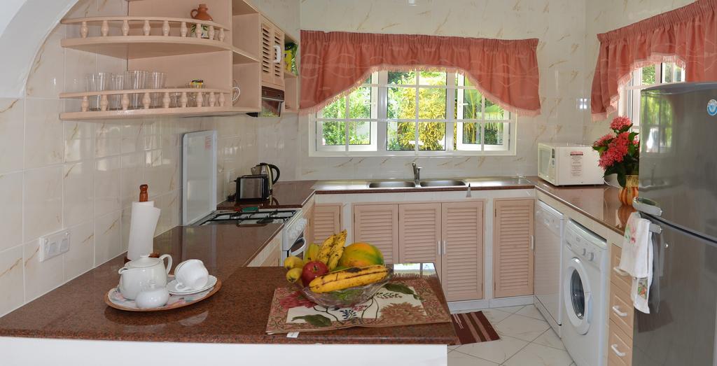 Ixora Villa Anse Royale Kamer foto