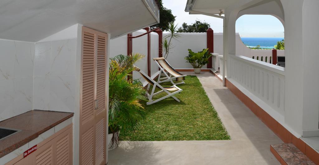 Ixora Villa Anse Royale Kamer foto